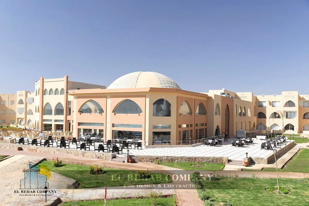 Completed main building with arched windows and dome